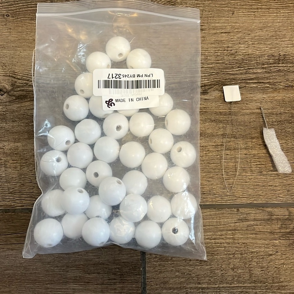 Wooden threading balls
